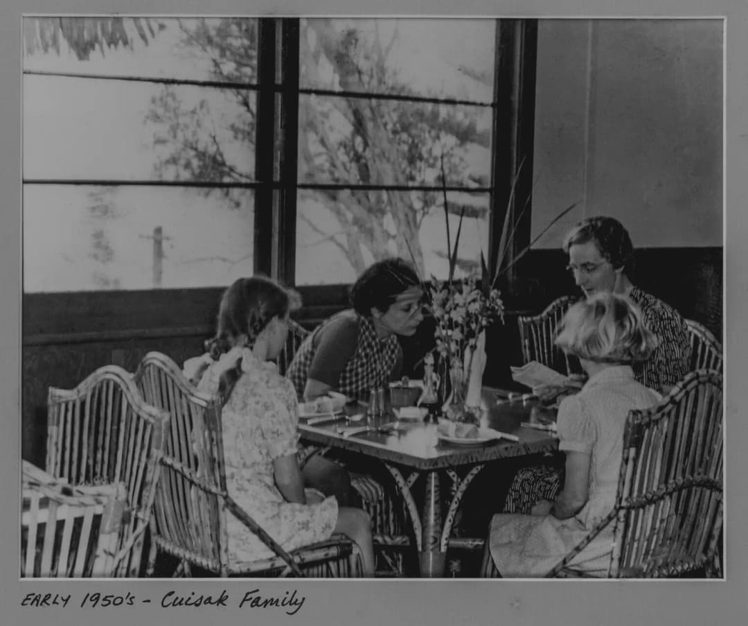 1950 - The Cuisak family in the dining room sat at a table