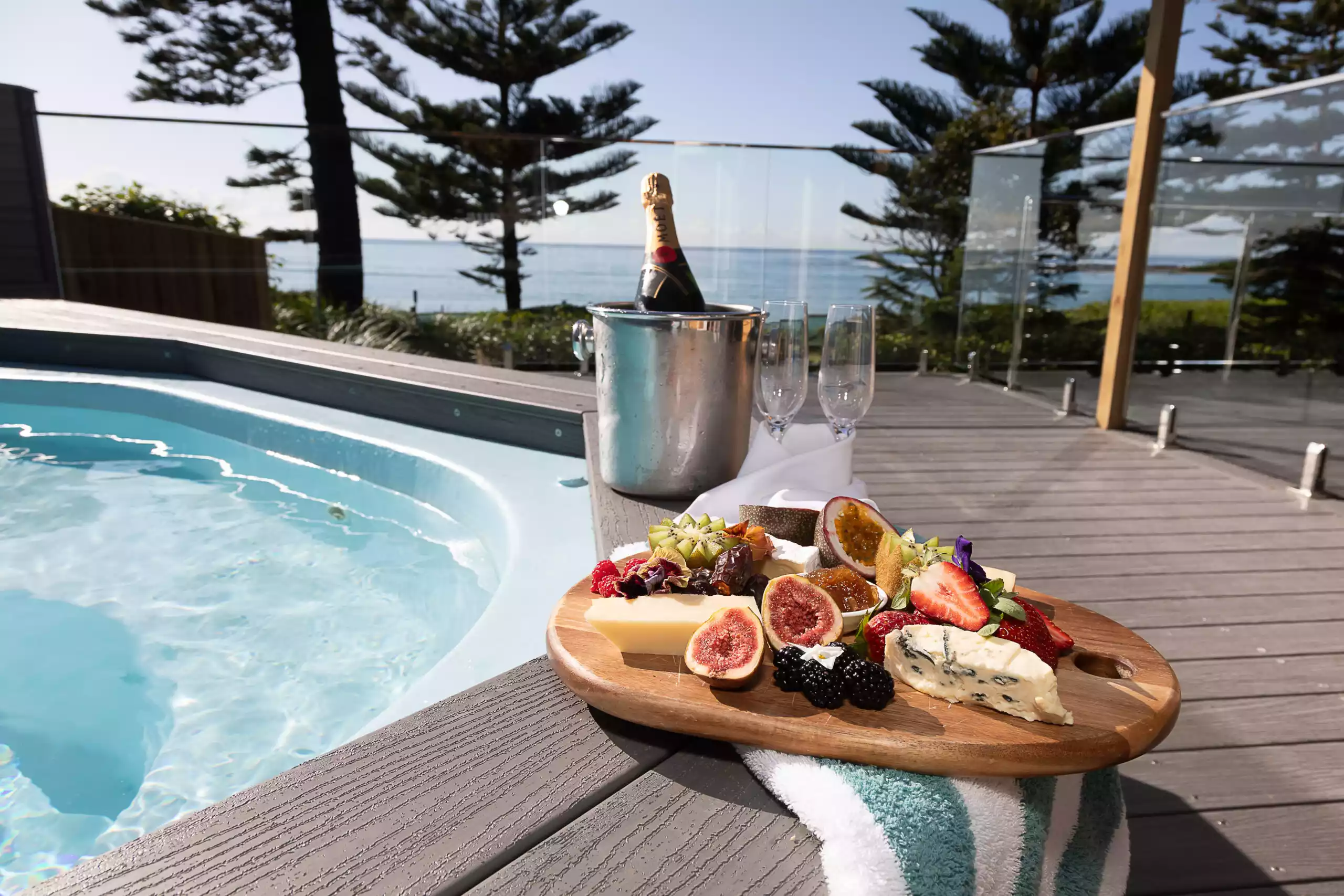 Platter of food overlooking a private pool